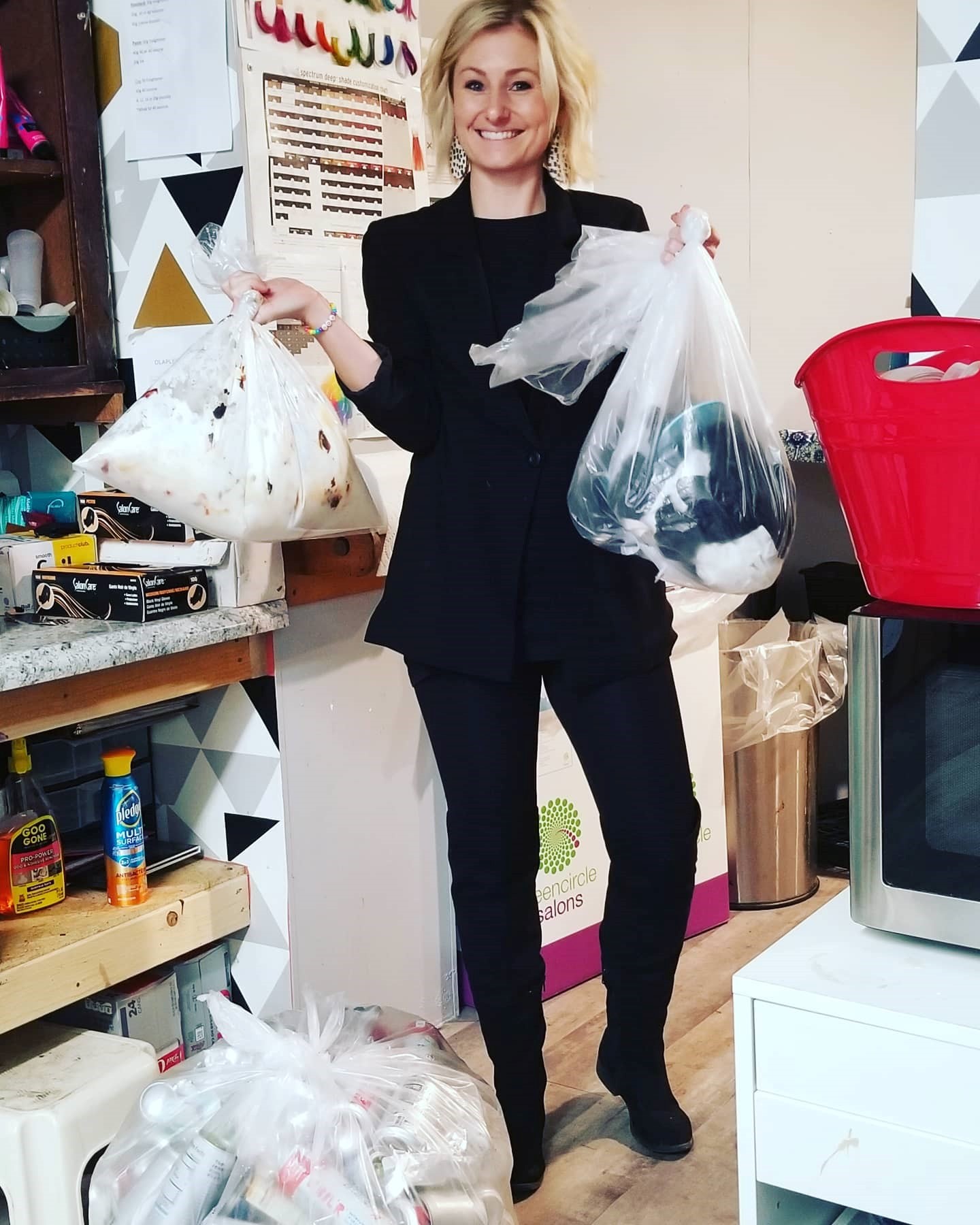Nostallja stylist Krissi Butenhoff with an assortment of recycling ready to be sent to Green Cycle.